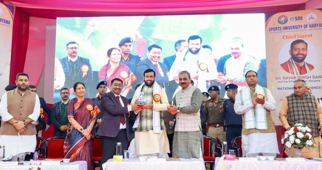 ‘आधुनिक खेल प्रबंधन का भारतीय मॉडल’ विषय पर दो दिवसीय कॉन्फ्रेंस का शुभारंभ, हरियाणा खेल मॉडल को वैश्विक नेतृत्व का नया आधार मानते हुए मुख्यमंत्री का संबोधन ‘आधुनिक खेल प्रबंधन का भारतीय मॉडल’ विषय पर दो दिवसीय कॉन्फ्रेंस का शुभारंभ, हरियाणा खेल मॉडल को वैश्विक नेतृत्व का नया आधार मानते हुए मुख्यमंत्री का संबोधन